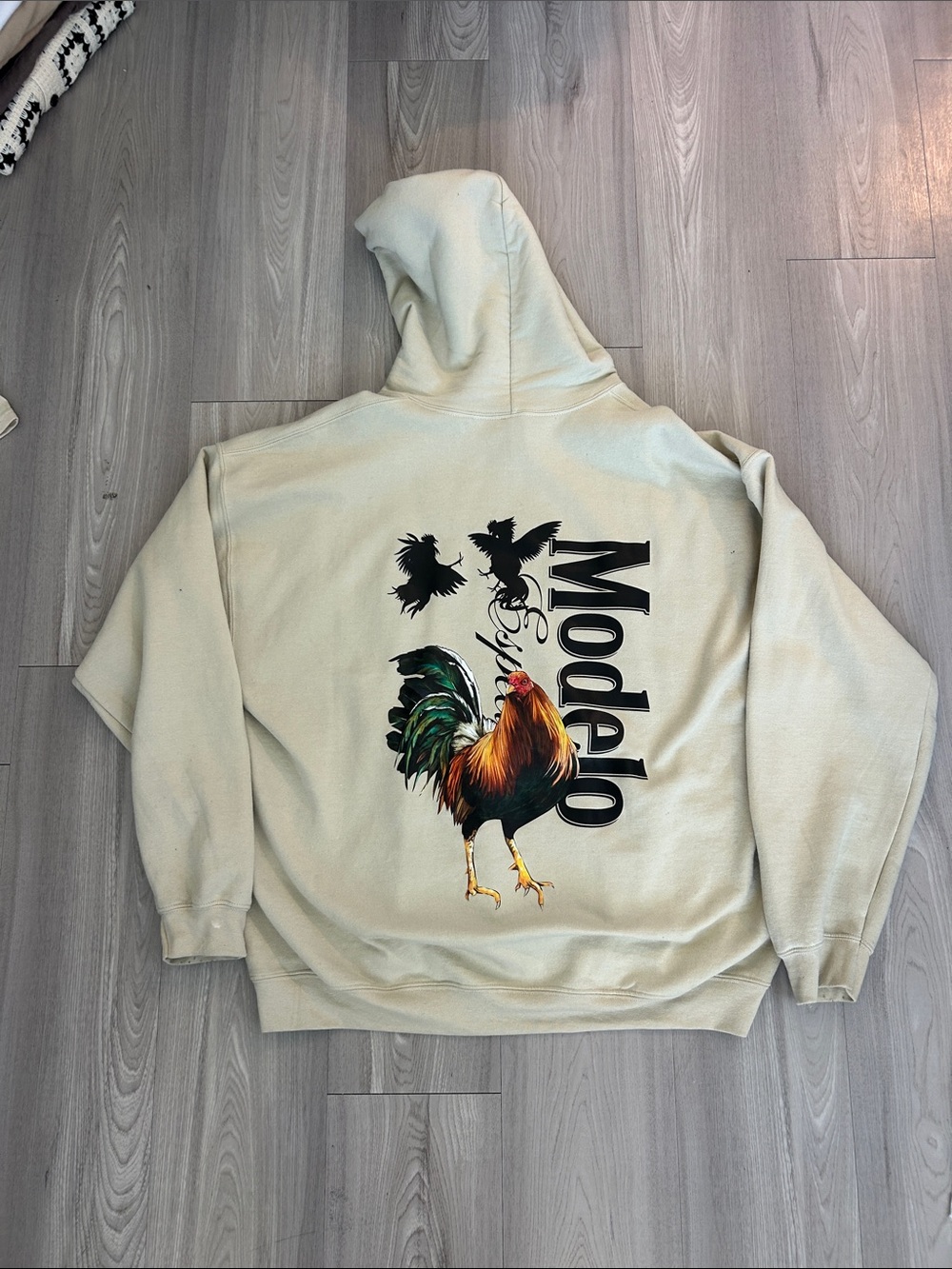 ModelCo Cream Hoodie with Multicolor Rooster Graphic